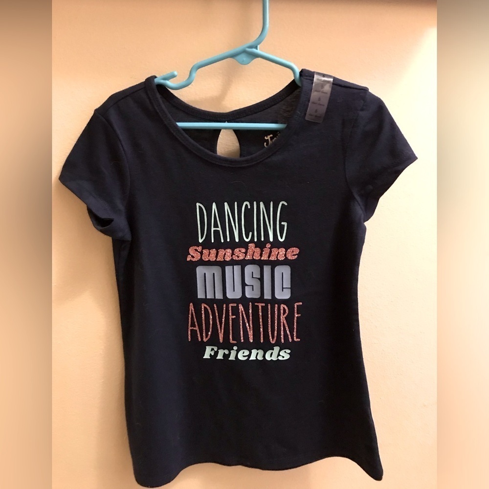 Justice girl’s blue t-shirt size 6.